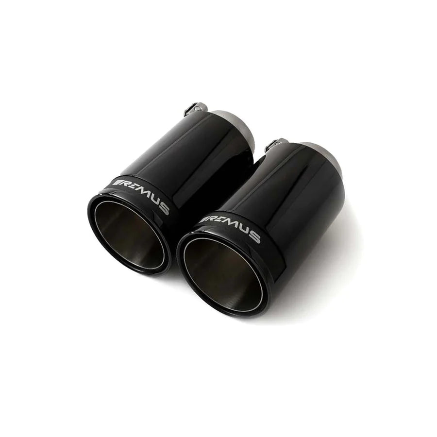 Set of four Remus stainless steel 98mm street race exhaust tips with black chrome finish and carbon fiber inserts.