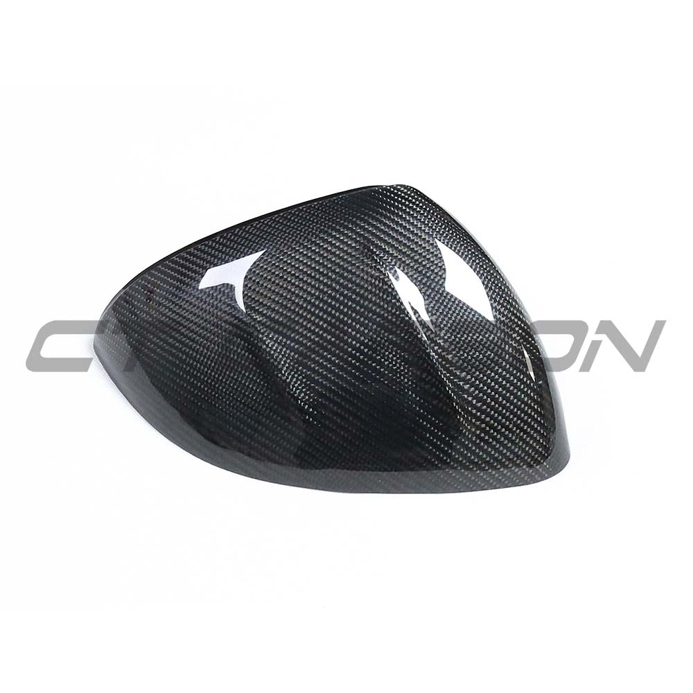 Mercedes C Class W206 2021-2023 dry carbon fiber mirror cover replacements by CT Carbon, showcasing sleek mirror covers.