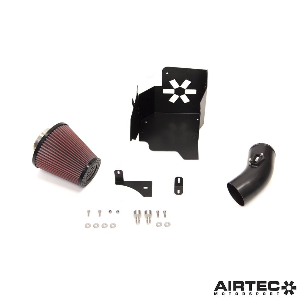 Airtec Motorsport induction kit installed in a BMW M135i F40 showing air intake components and performance-enhancing features.