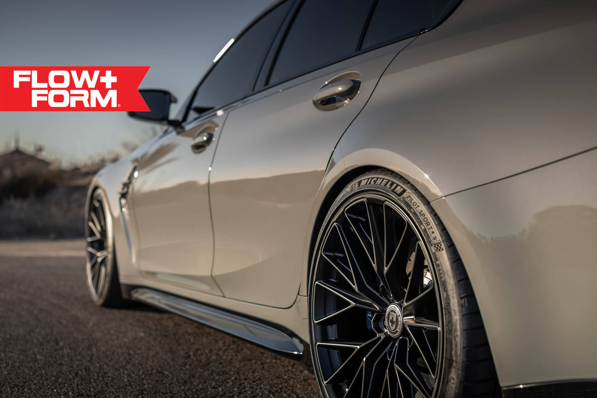 HRE PERFORMANCE WHEELS FF28 alloy wheel featuring a multi-spoke design with a polished finish, mounted on a vehicle.