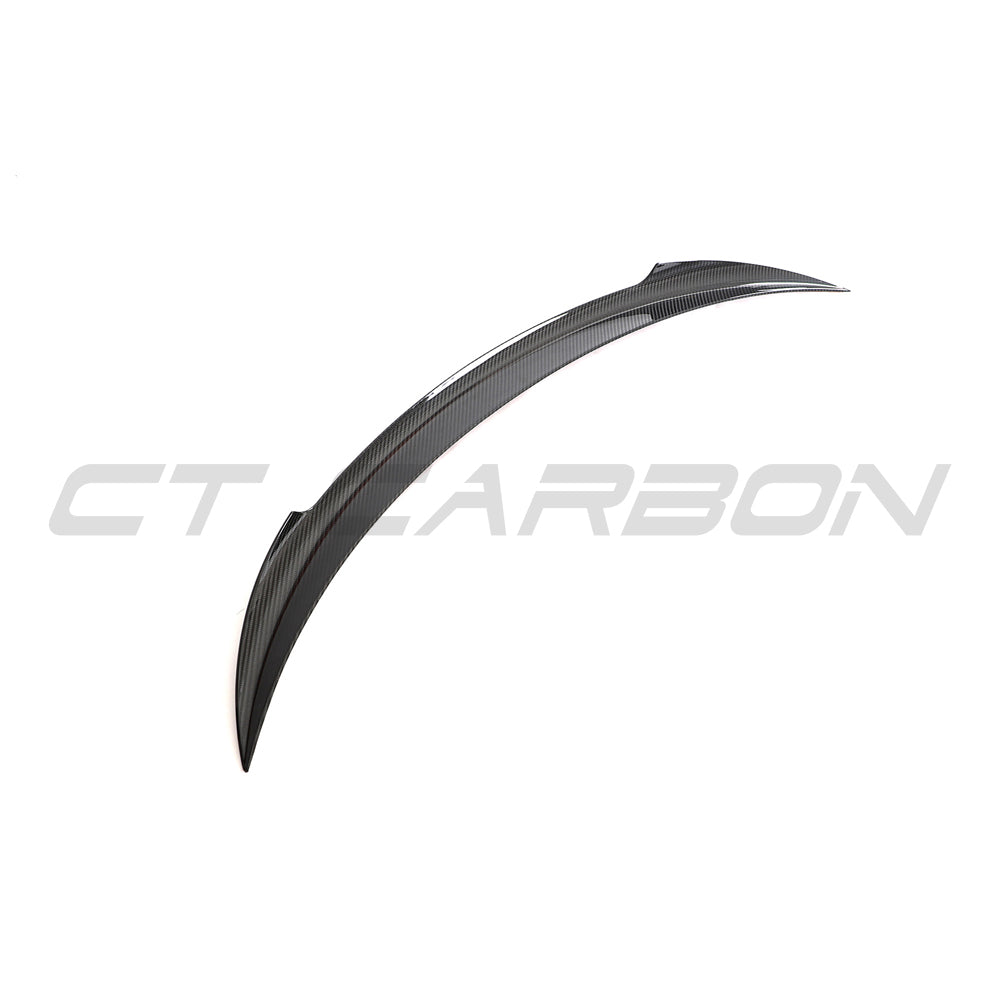 Tesla Model 3 Facelift 2023+ carbon fibre spoiler by CT Carbon, V2, mounted on the rear of the electric vehicle.