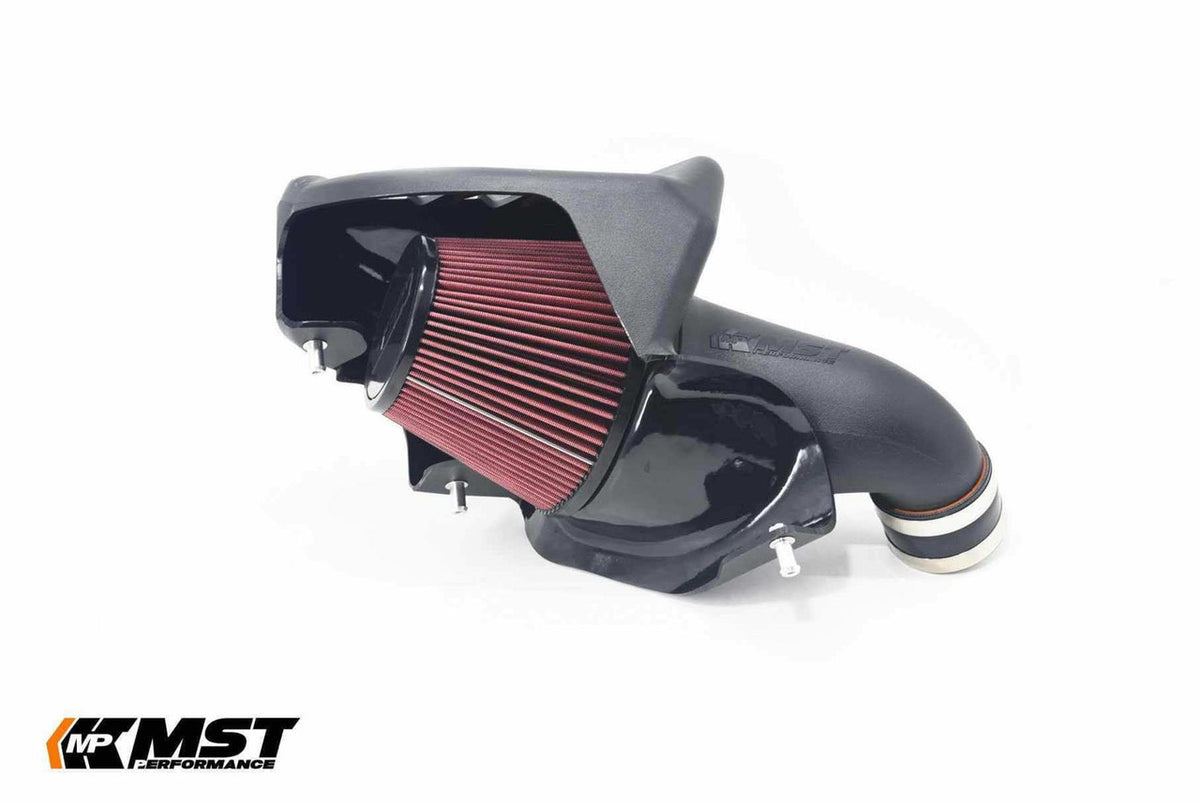 MST Performance induction kit for BMW G80 G82 M3 M4 Competition with S58 engine, showing air intake components and hoses.