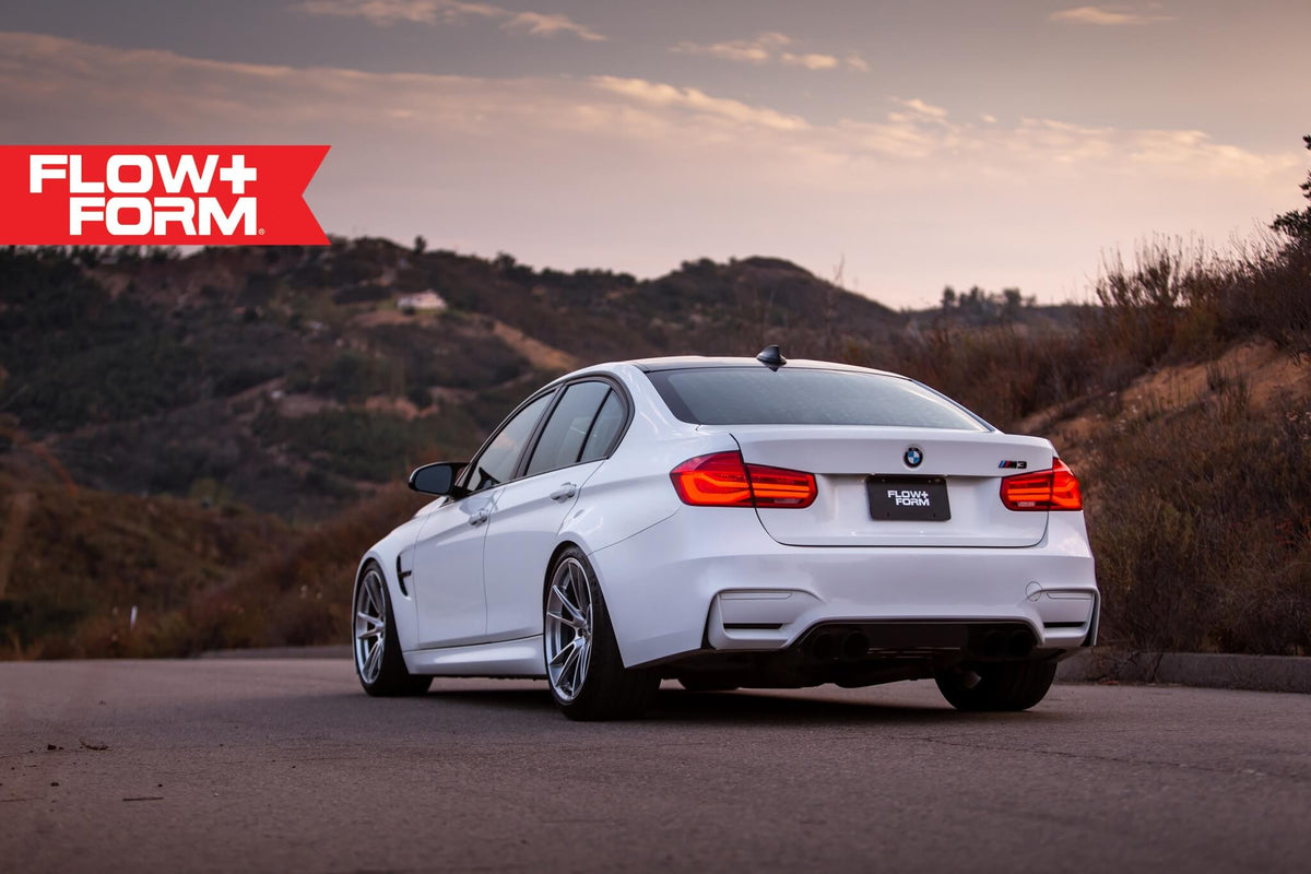 HRE PERFORMANCE WHEELS FF04 wheel with multi-spoke design and metallic finish, mounted on a vehicle.