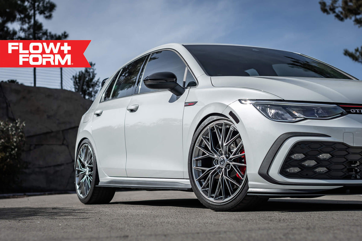 HRE PERFORMANCE WHEELS FF28 alloy wheels with a sleek multi-spoke design and finish, shown on a car.