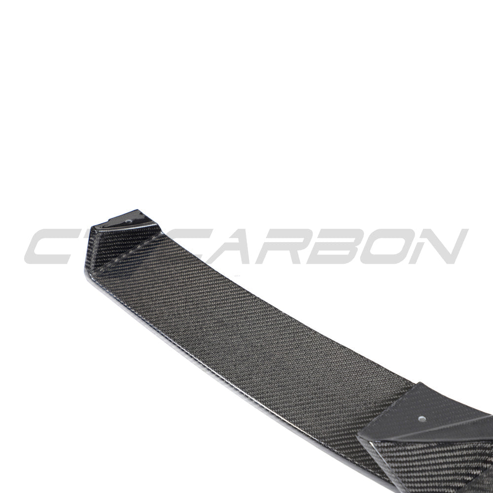 BMW X3/X4 G01/G02 LCI carbon fibre splitter by CT Carbon, showing the sleek, aerodynamic design on the front bumper.