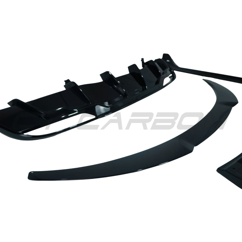CT Carbon gloss black full kit for Tesla Model 3 2023+ facelift, includes sleek exterior trim and accents.