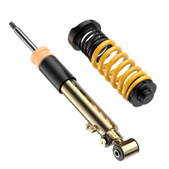 ST Suspension ST XTA PLUS coilovers for BMW F80 M3, F82 M4, F83 M4 with adjustable damping and top mounts, on a vehicle.