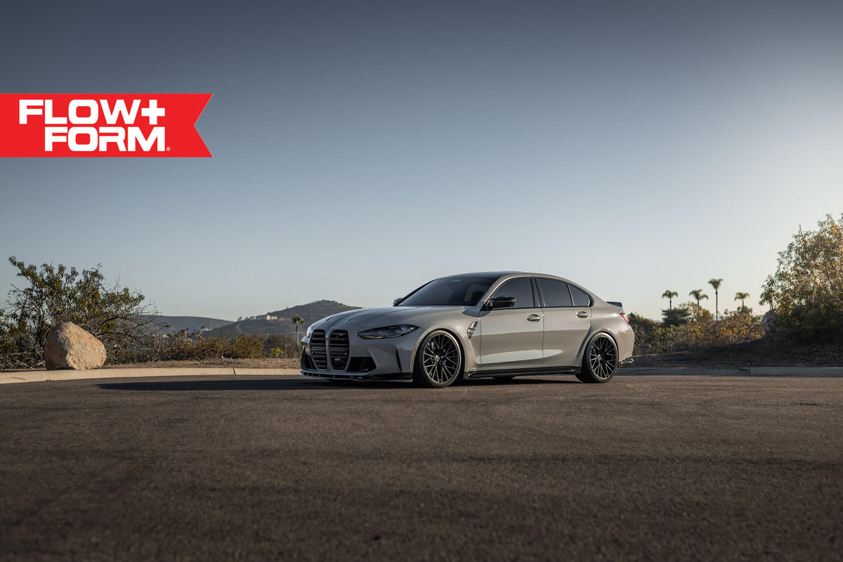 HRE PERFORMANCE WHEELS FF28 alloy wheels with a sleek multi-spoke design and polished finish, mounted on a vehicle.