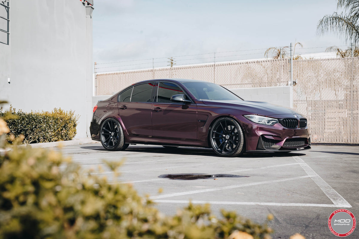 HRE Performance Wheels FF04 alloy wheels with multi-spoke design, shown on a vehicle with a sleek finish.