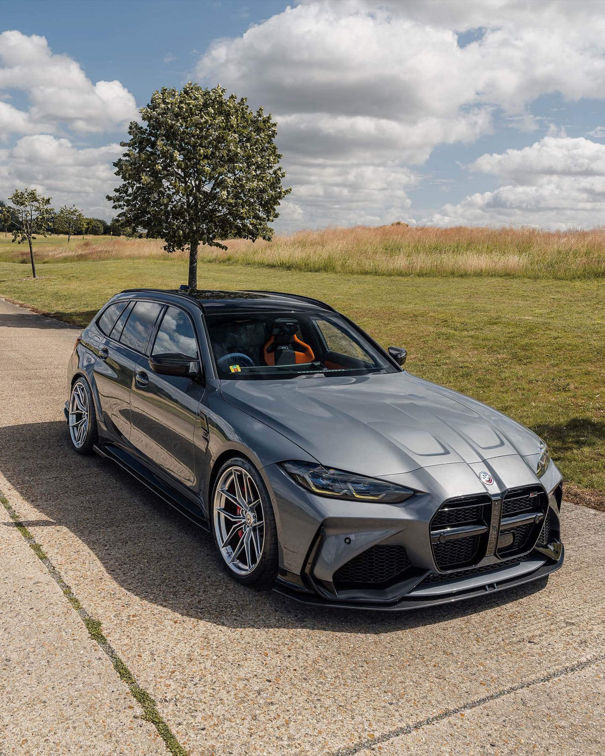 HRE PERFORMANCE WHEELS FF21 alloy wheel with multi-spoke design and polished finish, shown on a vehicle.