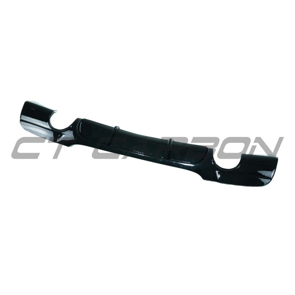 BMW 3 Series E90/E91 2005-2011 pre-LCI gloss black diffuser with dual exit, made by CT Carbon, installed on the rear bumper.