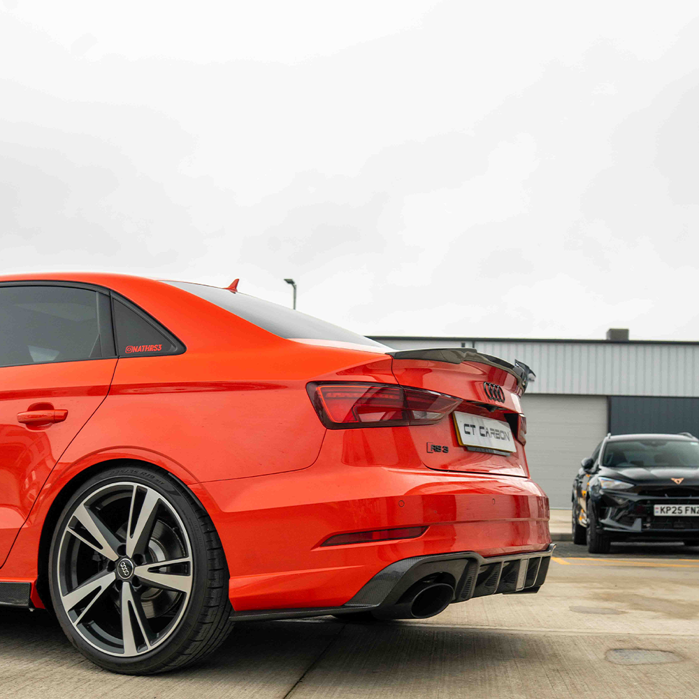 CT Carbon Audi RS3 8V saloon rear carbon diffuser with DTM light, showcasing sleek aerodynamic design and high-quality carbon material.