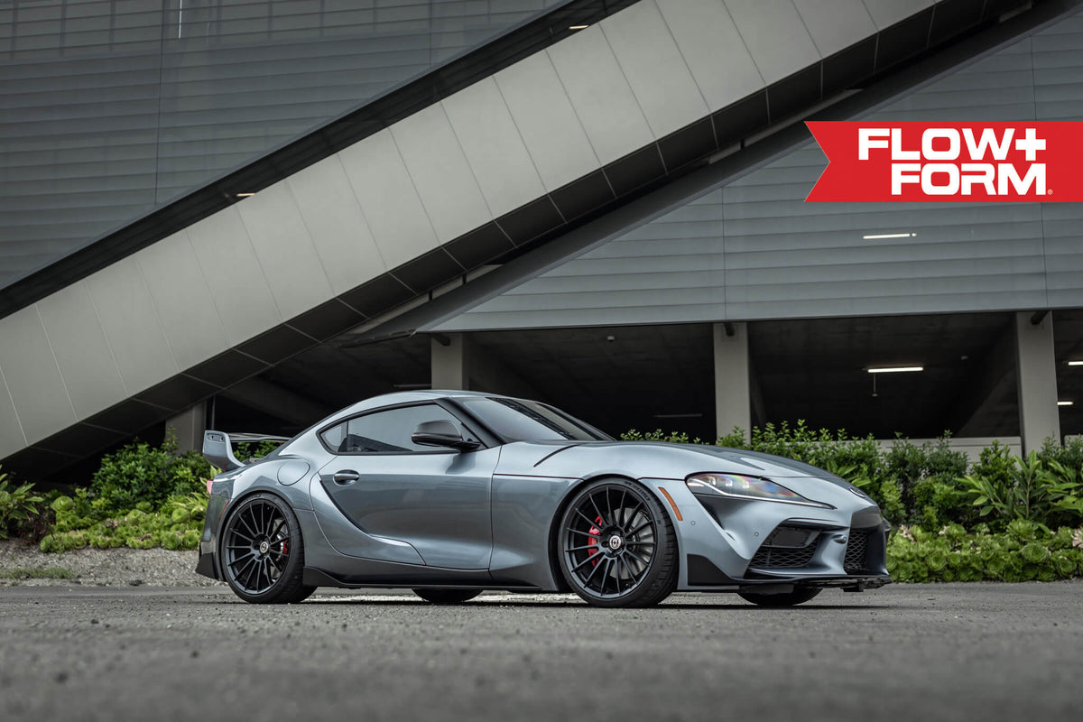 HRE PERFORMANCE WHEELS FF15 alloy wheels with a sleek multi-spoke design, displayed on a vehicle.