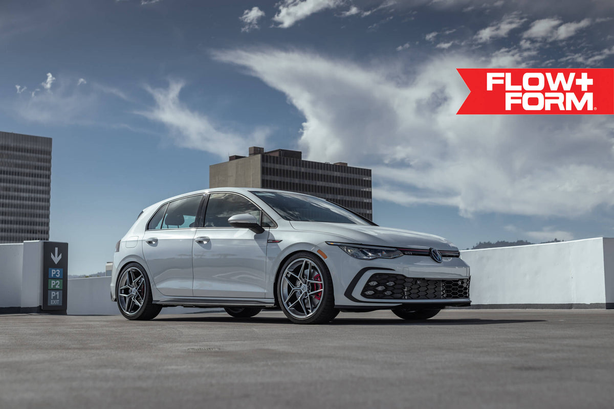 HRE PERFORMANCE WHEELS FF11 alloy wheels with multi-spoke design and polished finish, showcased on a vehicle.