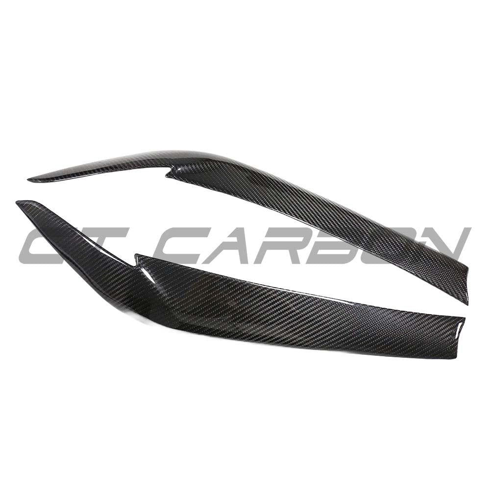 BMW G30 5 Series 2016-2023 CT Carbon dry carbon fibre eyelid accessory on car's front, enhancing sporty look.