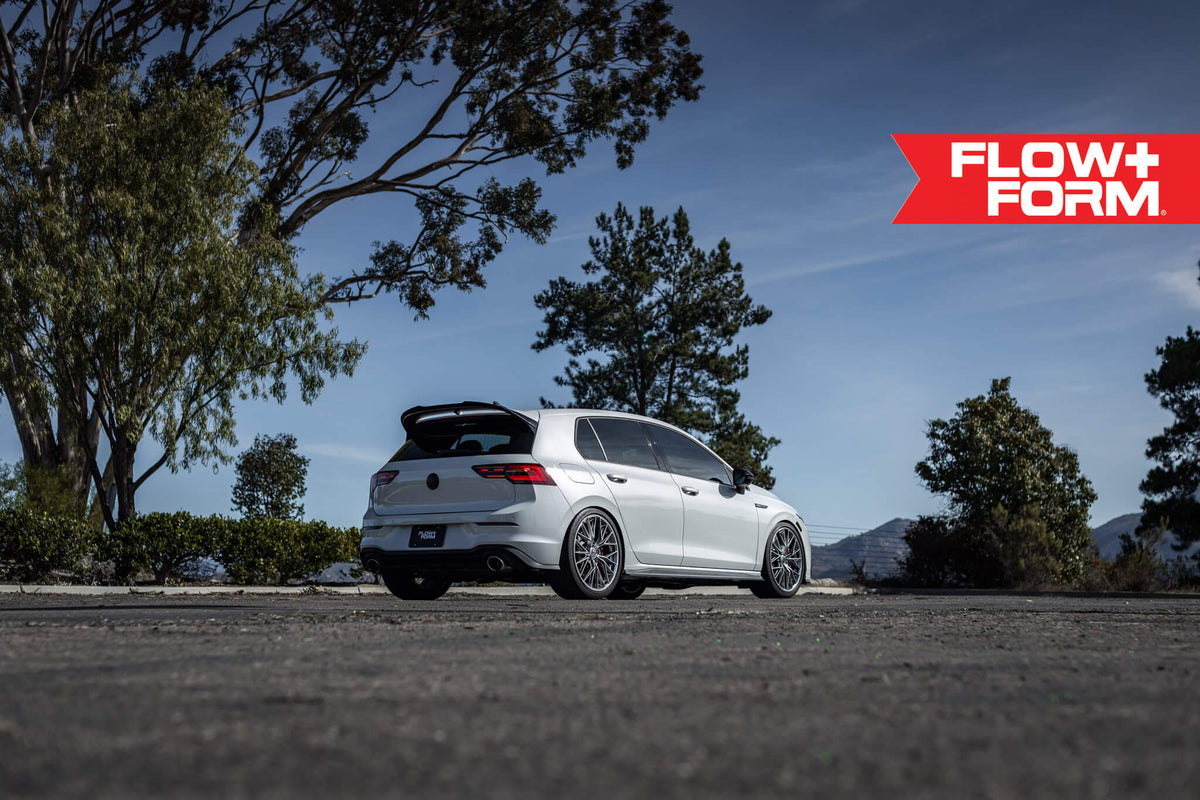 HRE PERFORMANCE WHEELS FF28 alloy wheels with a sleek multi-spoke design, shown on a vehicle for stylish road use.