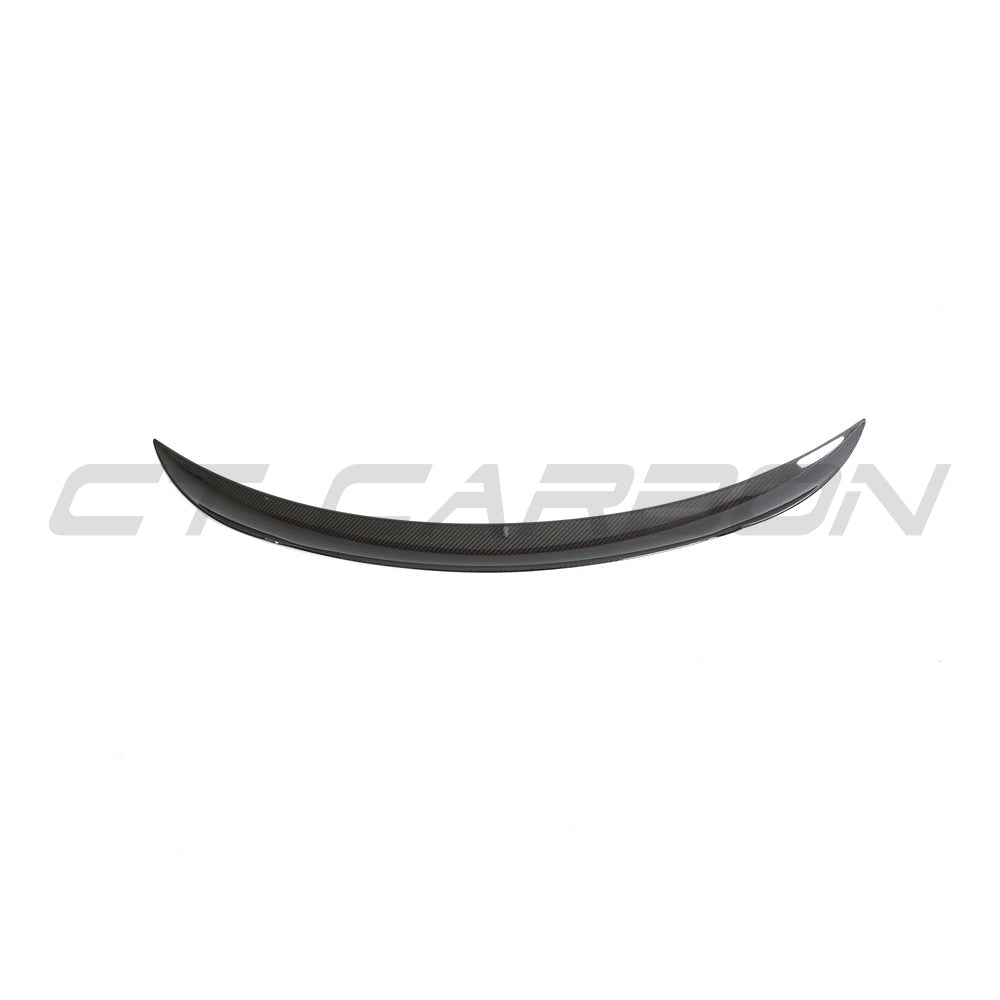 Tesla Model 3 facelift 2023+ carbon fibre spoiler by CT Carbon, V2, shown on sleek black car with close-up detail