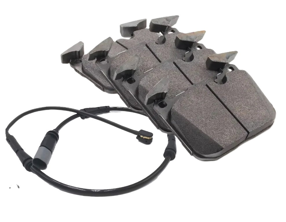 Genuine BMW F8X front brake pads with wear sensor for F80 M3, F82 M4, F87 M2, showing brake pad and sensor details