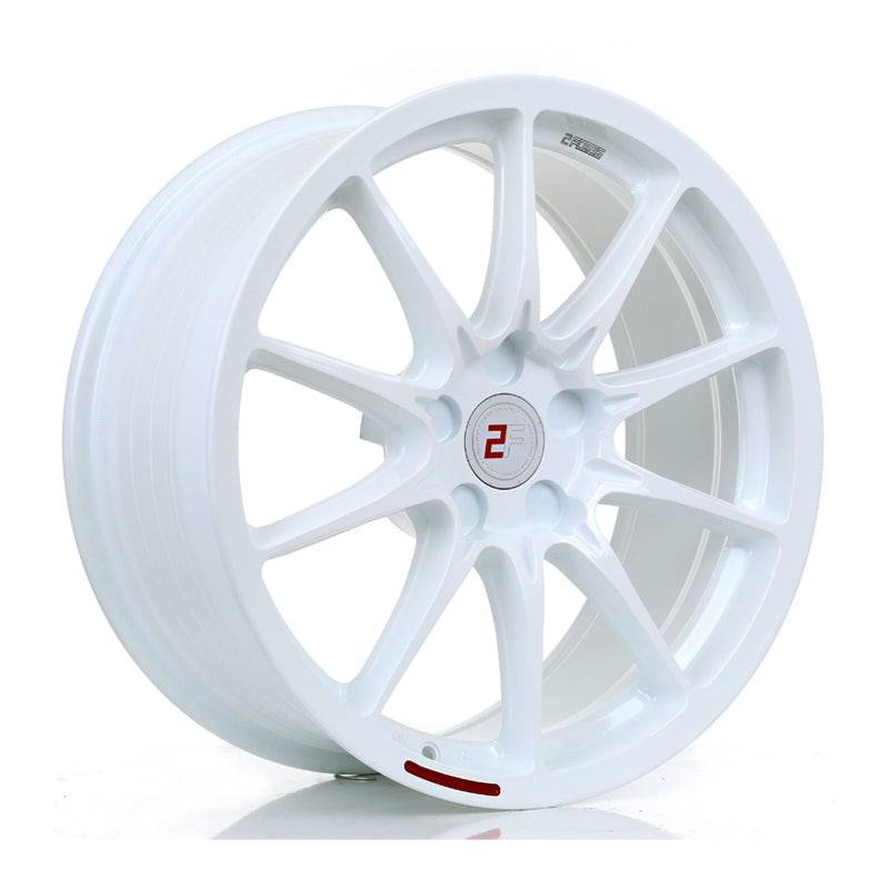 White 2Forge ZF8-R fully forged wheels with multi-spoke design, shown from an angled view highlighting the wheel's style and craftsmanship.