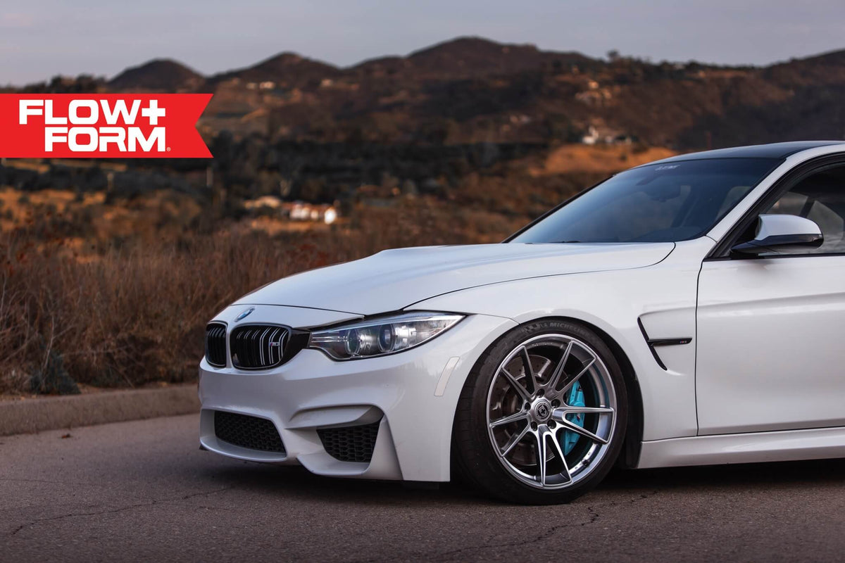 HRE PERFORMANCE WHEELS FF04 alloy wheels with multi-spoke design on a vehicle, showcasing their sleek, high-performance style.