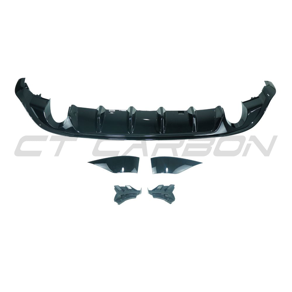 Gloss black carbon fiber diffuser for Volkswagen Golf GTI/GTD MK7/7.5 2017-2020, designed for a sleek, sporty look.