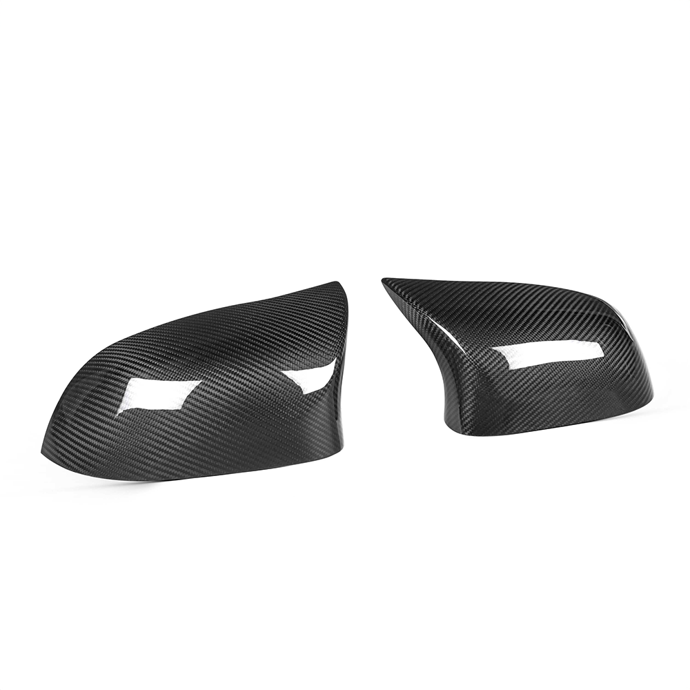 BMW X5/X6 F15/16 carbon fiber mirrors by CT Carbon, sleek black side mirror with textured carbon fiber finish.