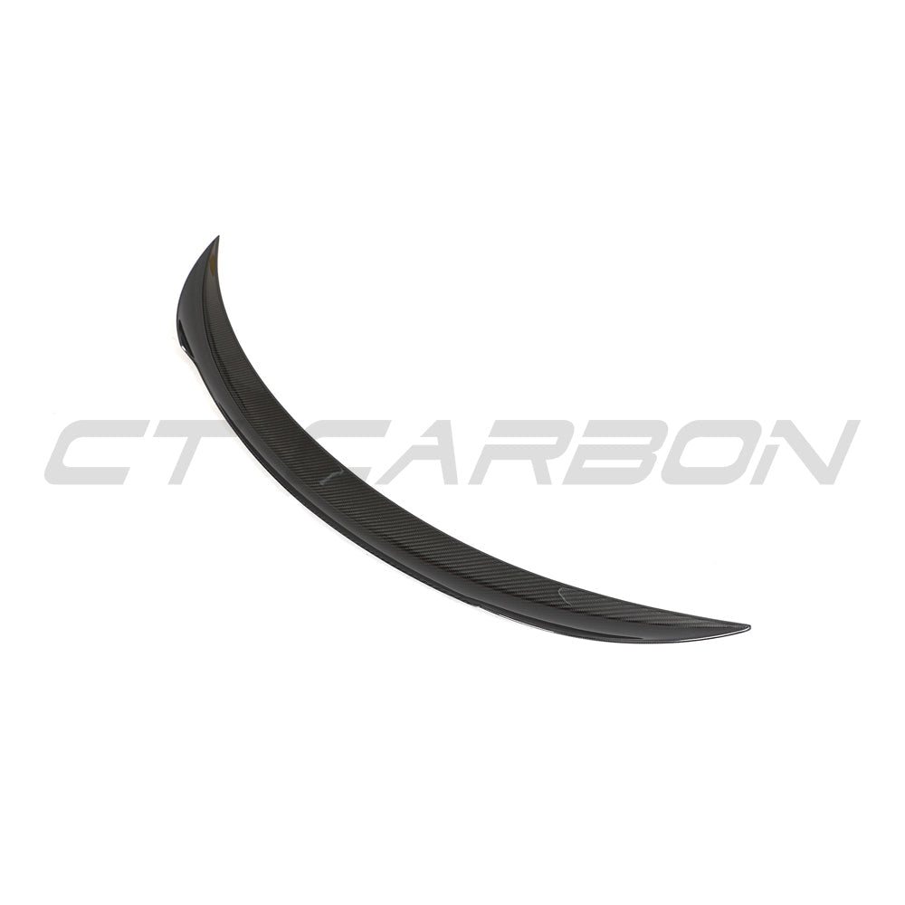 Tesla Model 3 facelift 2023+ carbon fibre spoiler by CT Carbon, showing the sleek aerodynamic V2 spoiler on the car's rear.