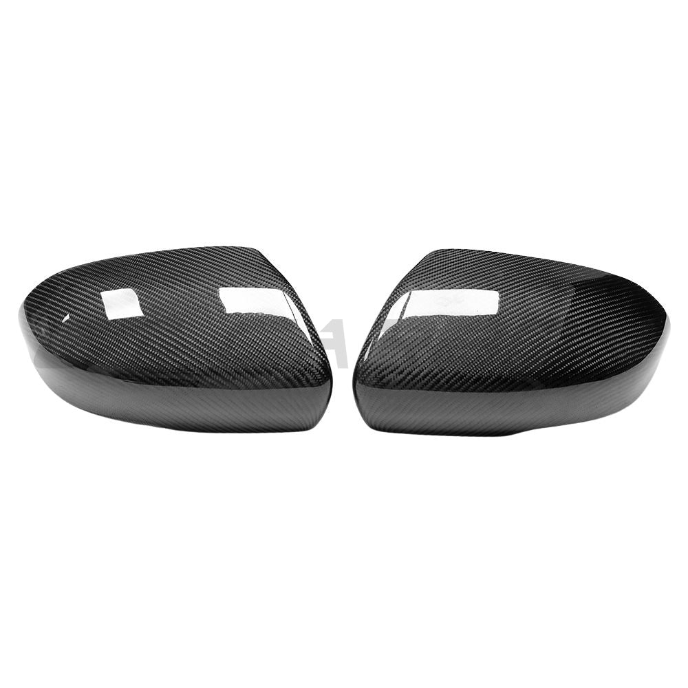 Carbon fiber side mirror covers for Land Rover Evoque L538 2012-2013 by CT Carbon, showcasing sleek, textured finish.