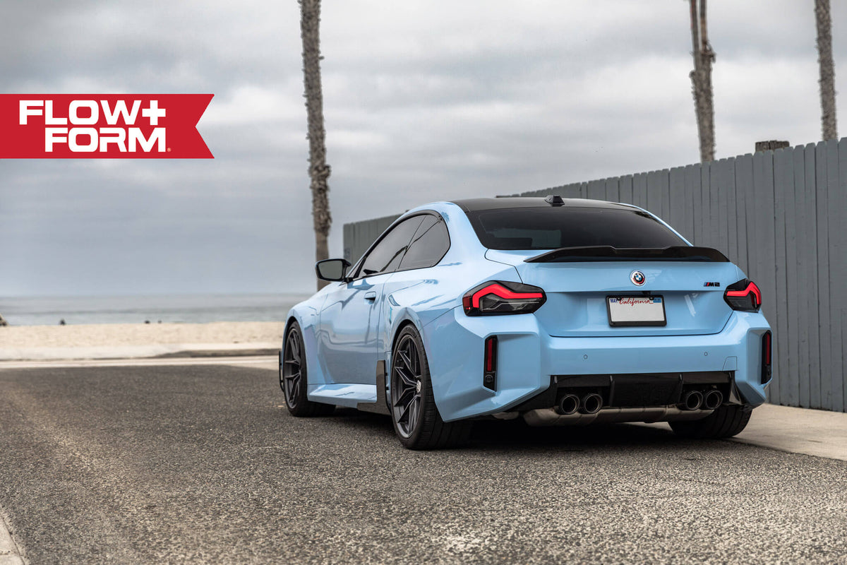 HRE PERFORMANCE WHEELS FF21 alloy wheels with multi-spoke design and silver finish on a vehicle.