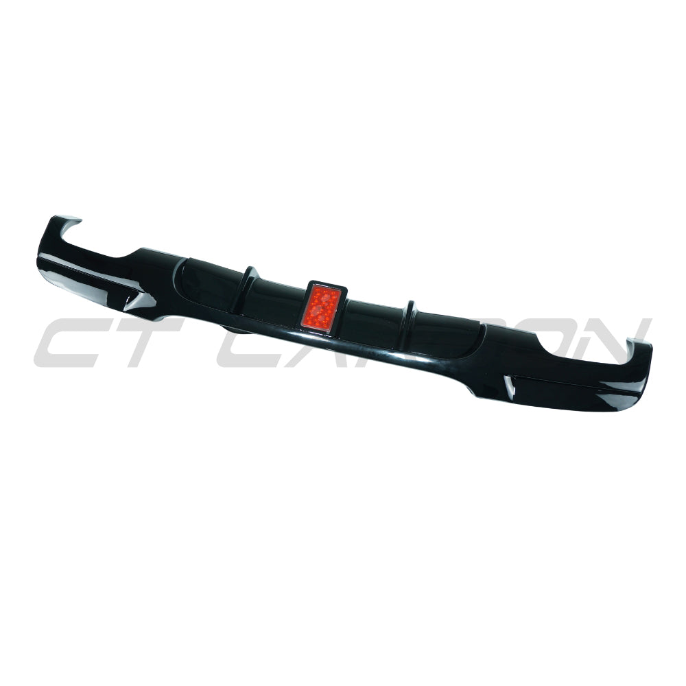 BMW 3 Series E90/E91 2005-2011 gloss black LED diffuser with quad tips, designed for sporty rear styling by CT Carbon.