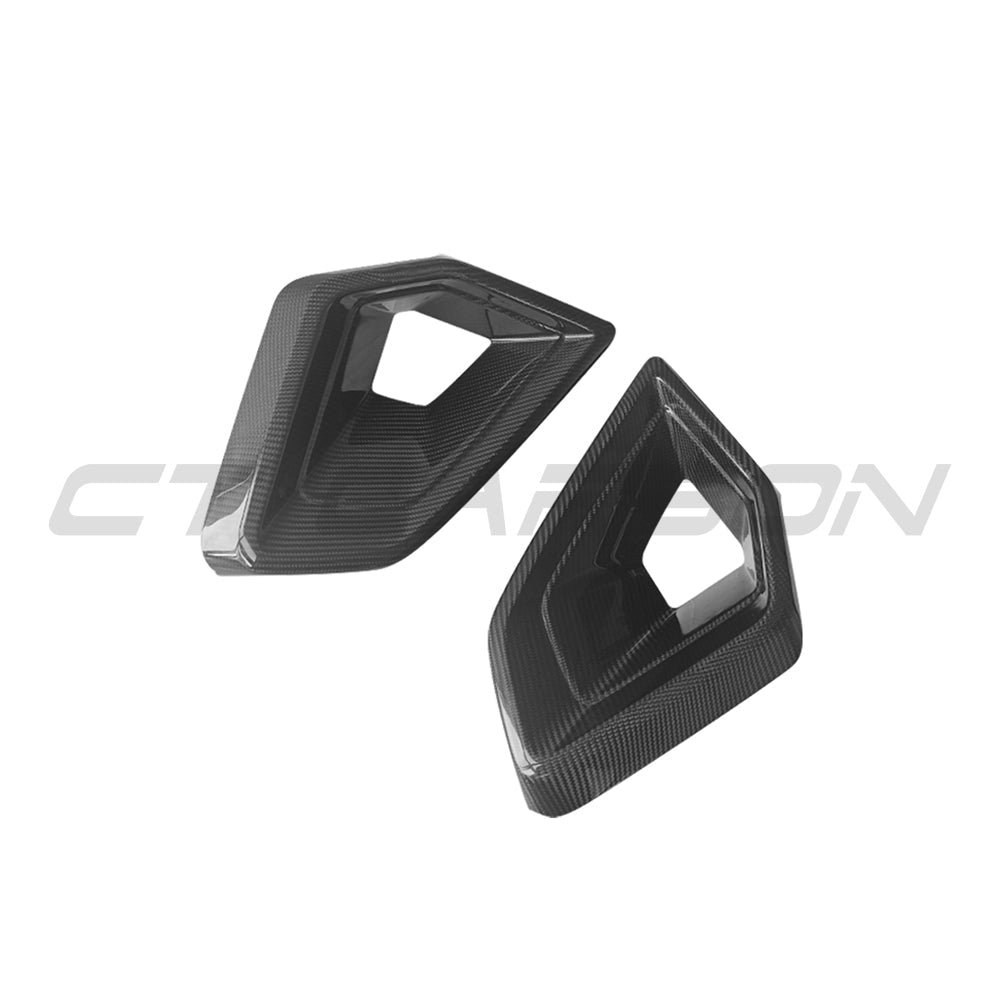 BMW G05 X5 LCI 2023 full carbon fiber kit by CT Carbon, showing sleek carbon fiber panels and detailed automotive parts.
