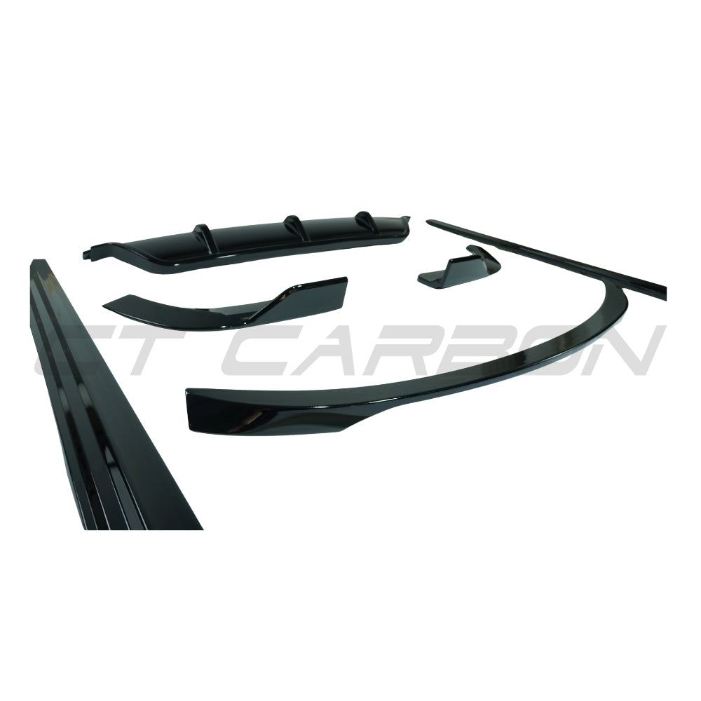 Full gloss black kit for BMW X6 F16 2014-2018 by CT Carbon, showing sleek, high-quality exterior car accessories.