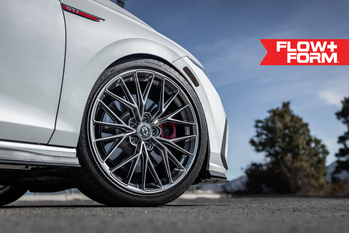 HRE PERFORMANCE WHEELS FF28 alloy wheel with multi-spoke design and matte finish on a car wheel.
