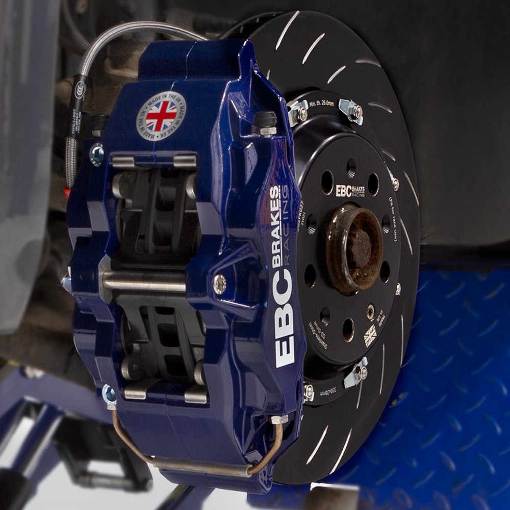 EBC Racing front racing 2-piece floating brake discs with TRW caliper installed on an Audi, Cupra, Seat, Skoda, or VW vehicle.