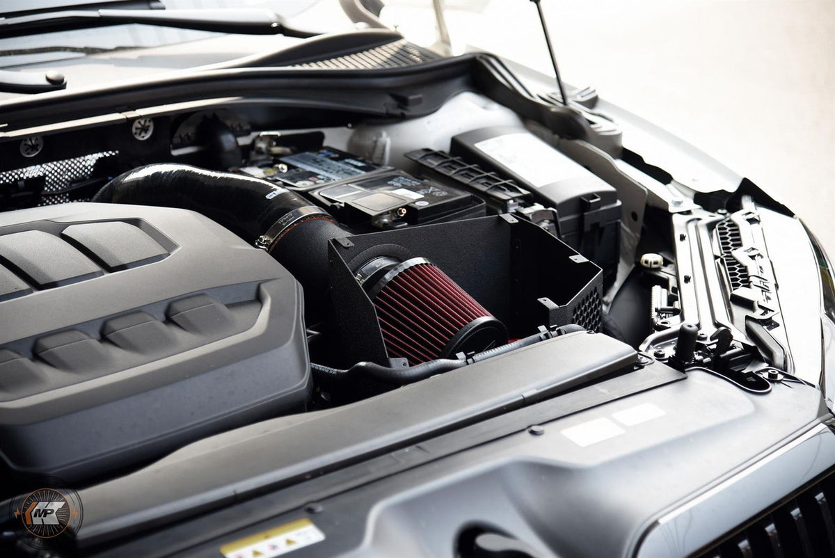 MST Performance induction kit for MK8 Golf EA888 EVO, showcasing the air intake components and branding.