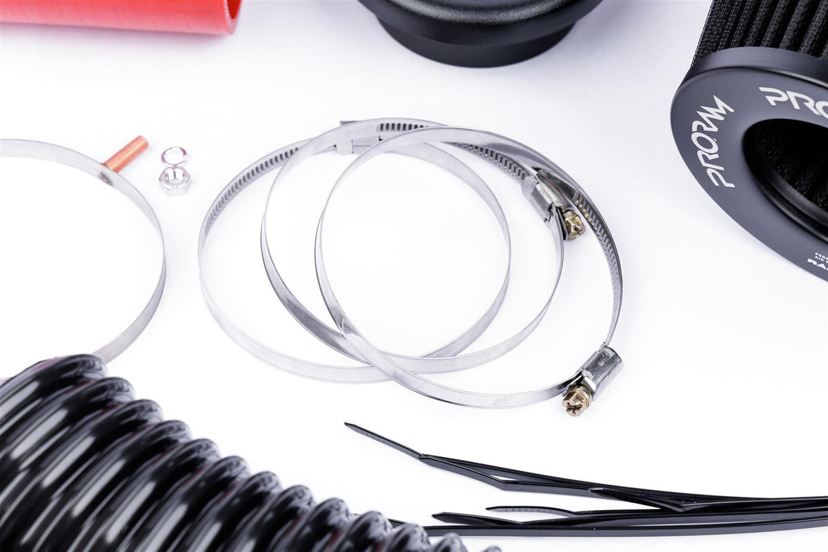Ramair Proram Induction Kit for VW MK5 R32 with red hoses, featuring high-performance air intake components and branding.