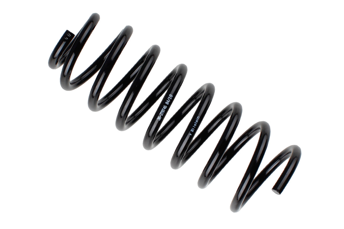 Bilstein B3 rear coil spring for Audi 100, part number 36-279746, showing the spring's coils and metal construction.