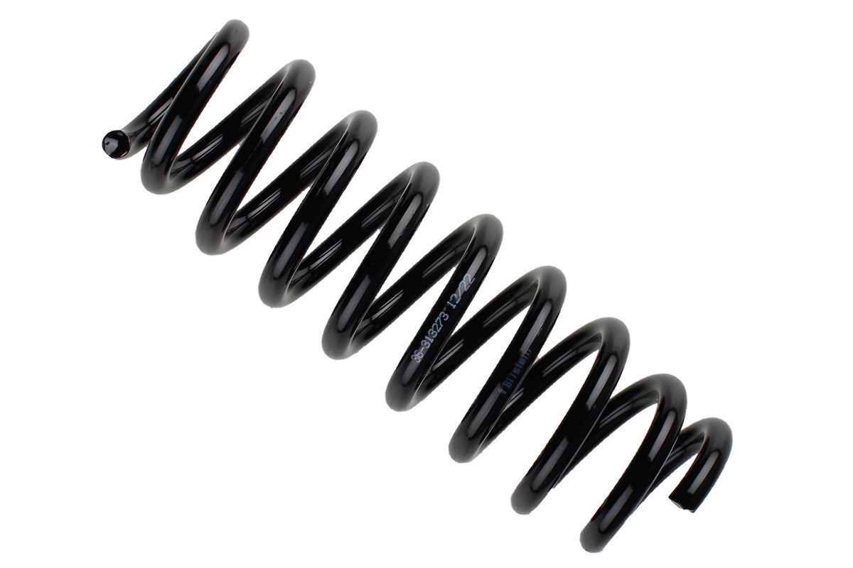 Bilstein B3 OE replacement coil springs for BMW E90 H, showing the black coil spring with metal hooks and coils.
