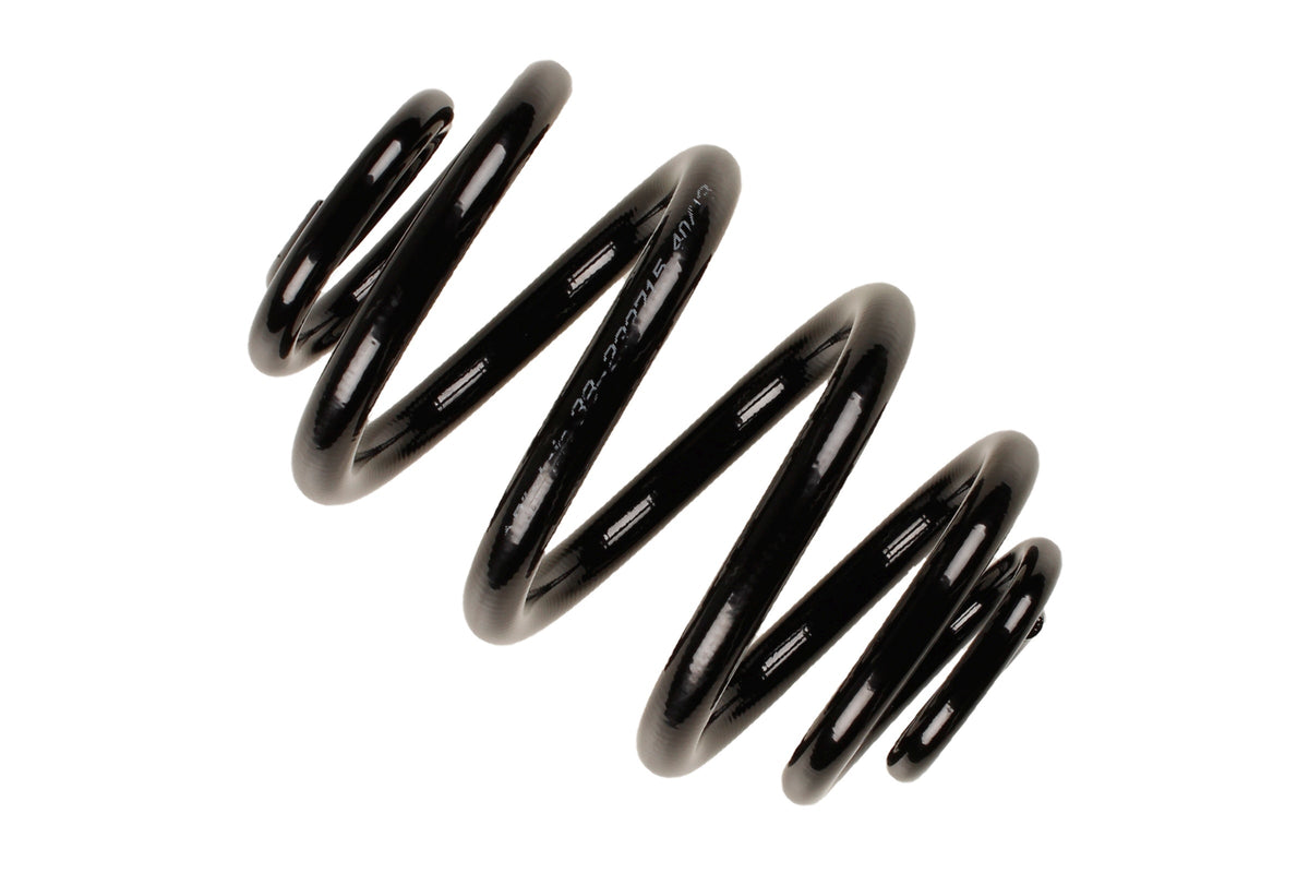 Bilstein B3 OE replacement coil spring for BMW 3 Series E46, part number 38-233715, showing the black steel spring in close-up.