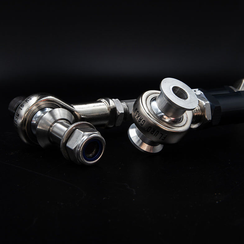 Suspension Secrets adjustable rear camber arms for BMW G87 M2, part of the kinematics kit, shown in the image.