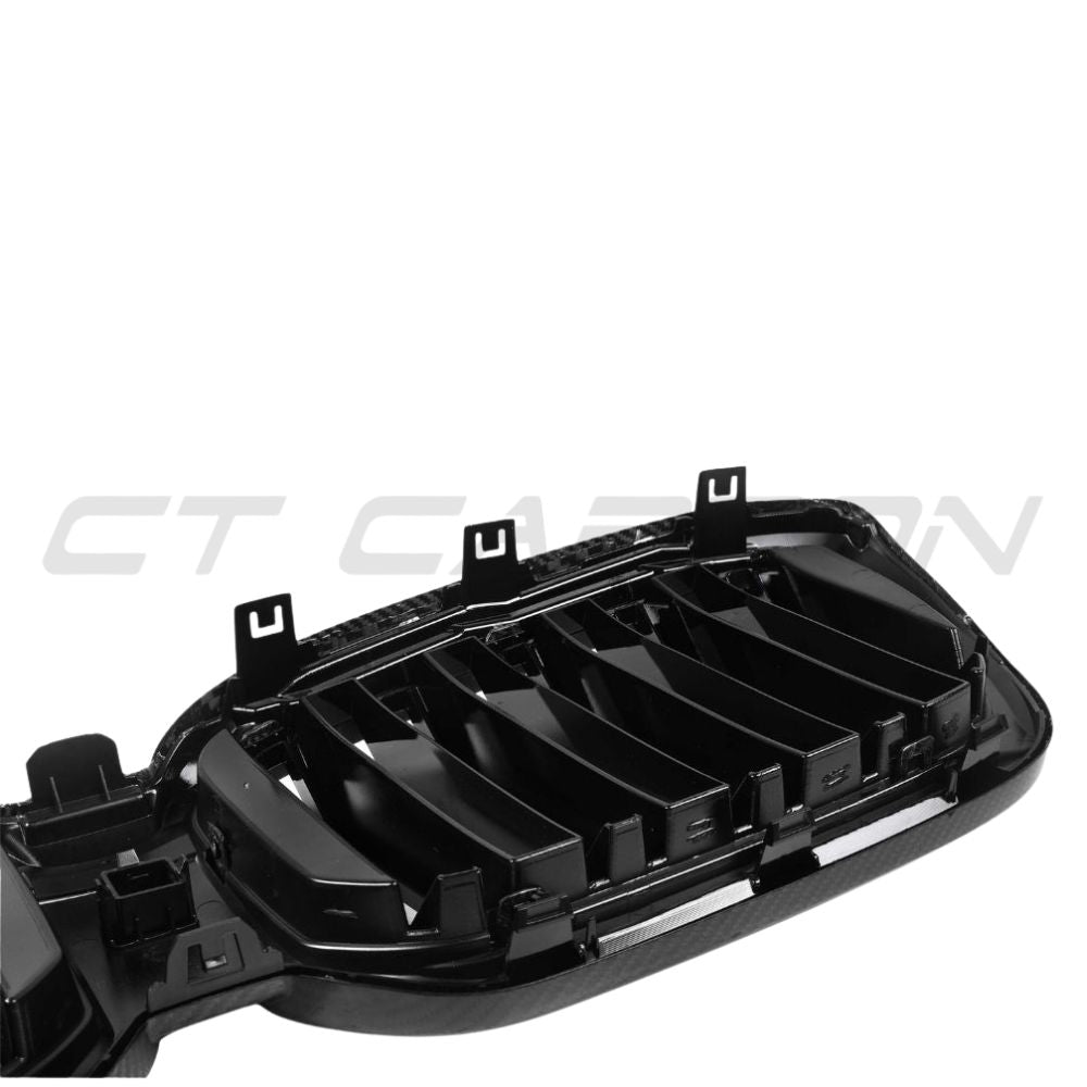 BMW G01 G02 X3 X4 MCI carbon fiber grille by CT Carbon, featuring double slat design for 2022-2024 models.