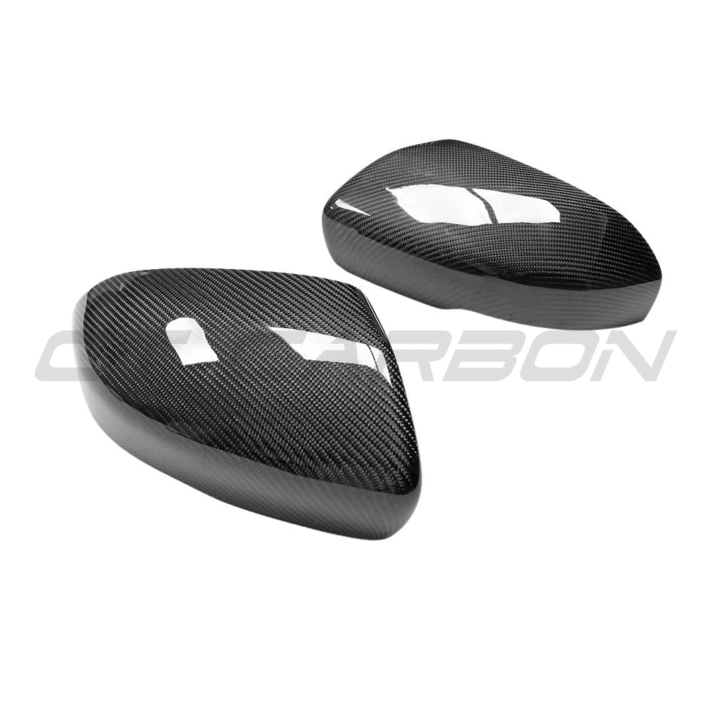 Carbon fibre side mirror covers for Land Rover Evoque L538 2012-2013, accessories by CT Carbon, shown on vehicle mirrors.