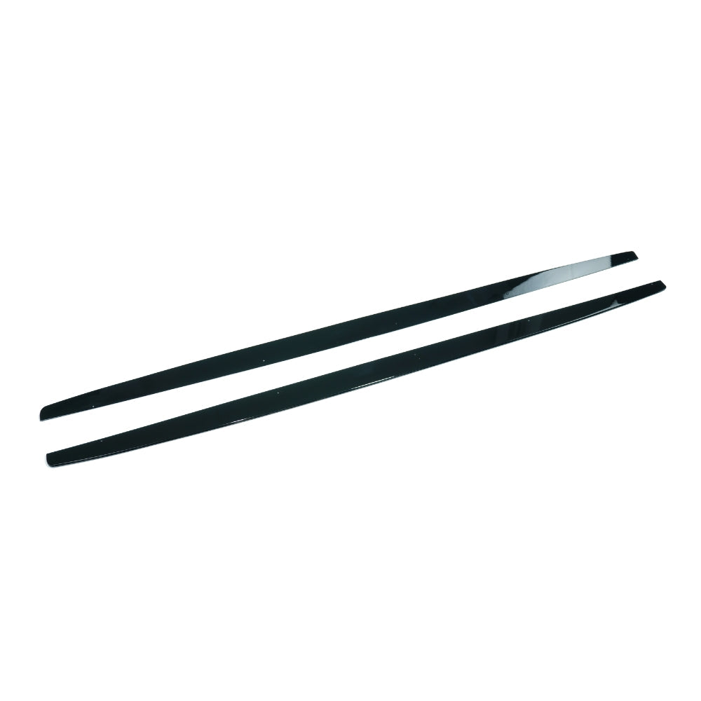 BMW 1 Series E82/E83/E87/E88 side skirts in gloss black by CT Carbon, showing the sleek, aerodynamic design of the car accessories.