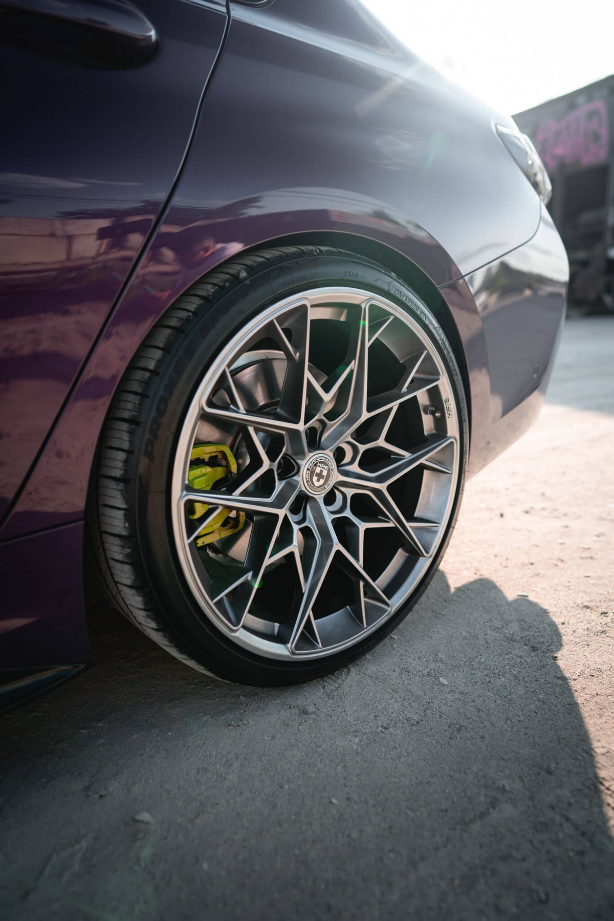 HRE PERFORMANCE WHEELS FF10 alloy wheels with a multi-spoke design, shown on a car in a close-up view.