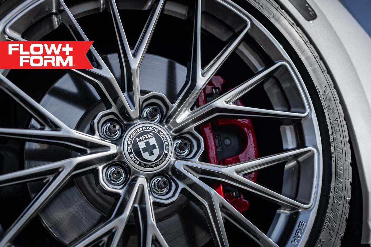 HRE PERFORMANCE WHEELS FF28 alloy wheel featuring a multi-spoke design and polished finish, mounted on a vehicle.
