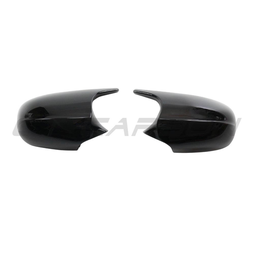 Black exterior mirrors for BMW 1 and 3 Series E82, E83, E87, E88, E90, E91, E92, E93 models by CT Carbon, gloss finish.