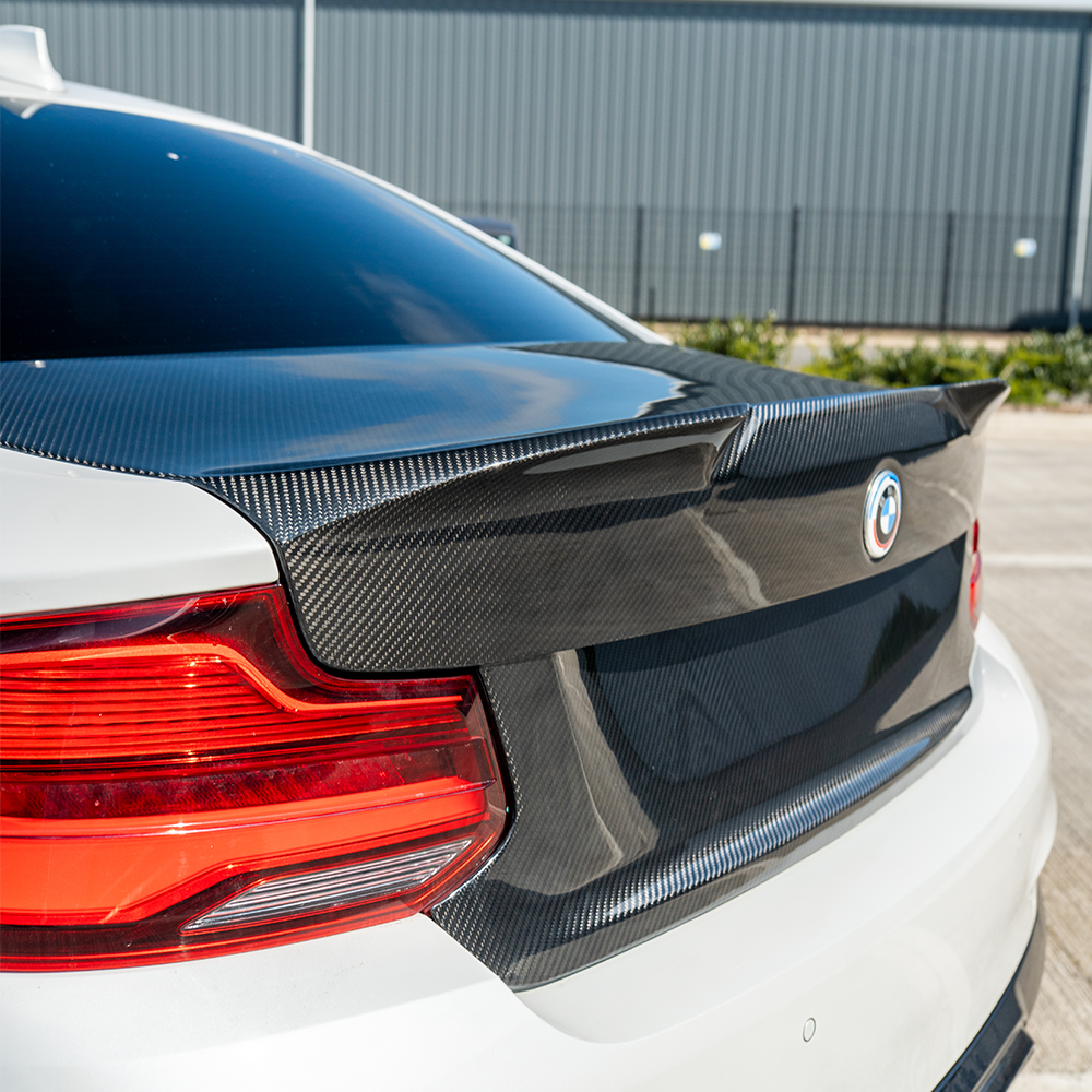BMW M2 F87 and F22 carbon fibre bootlid by CT Carbon, lightweight and aerodynamic replacement for enhanced performance.