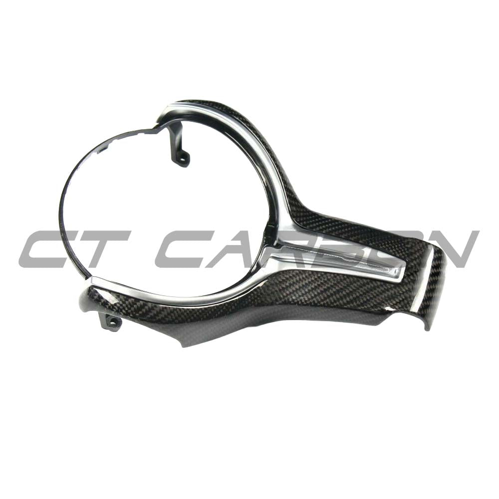 BMW Fxx M series carbon fiber steering wheel trim accessory by CT Carbon, showing close-up of sleek, textured carbon fiber finish.