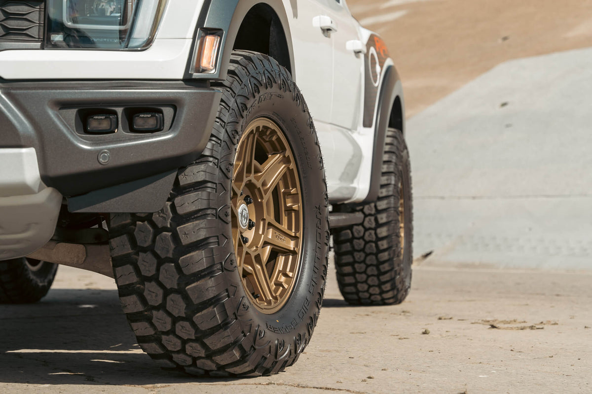 HRE PERFORMANCE WHEELS FT1 alloy wheel set featuring sleek multi-spoke design and a polished finish on a car.