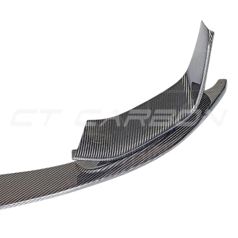 BMW M3 M4 F80 F82 F83 carbon fibre splitter set, three-piece V1 style, with detailed view of lightweight, aerodynamic design by CT Carbon.